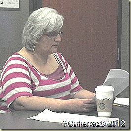 Cathy studying materials during a meeting in Tempe, Az.  