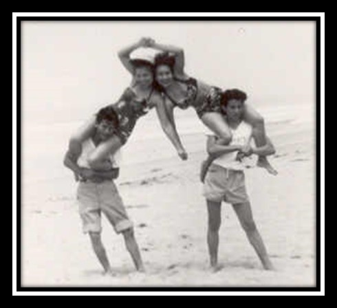 Cathy's dad, her aunt and their two friends are having fun at the beach! Circa 1940's.